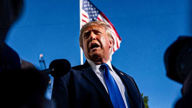 President Donald Trump standing in front of a flag | Bonnie Cash-Pool via CNP/CNP/Polaris/Newscom
