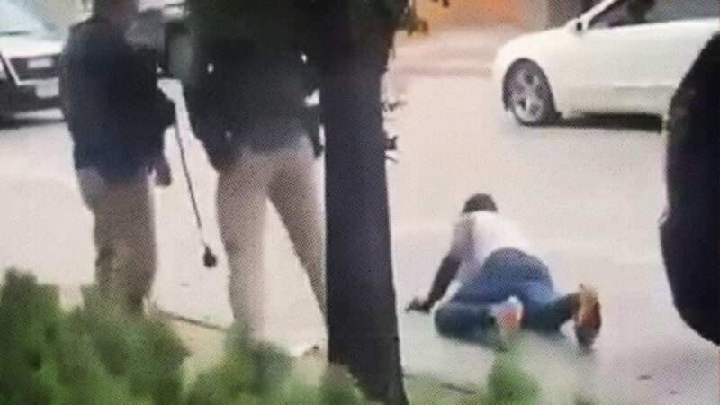 Bystander video of Immigration and Customs Enforcement agents standing over an unidentified man on the ground in Evanston, Illinois. | Jorge M&uacute;jica Murias/Facebook