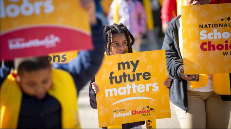 Kids hold education policy rally signs | School Choice Week/Instagram
