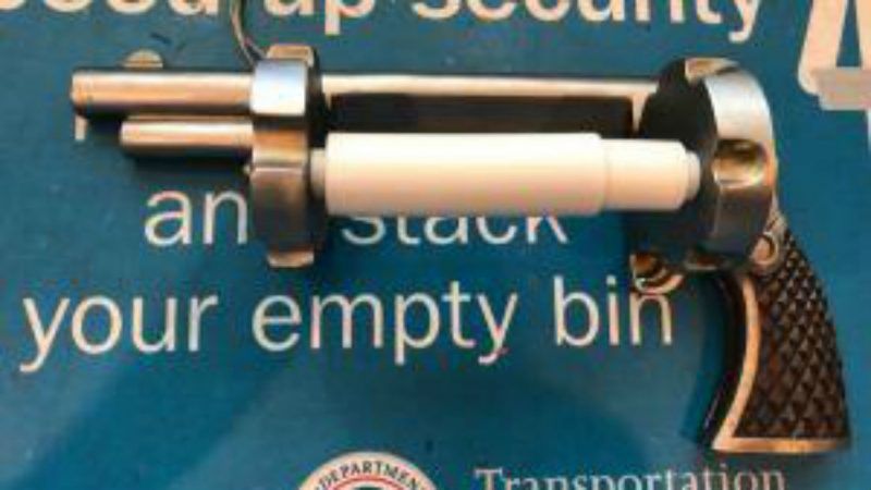 TSA confiscates a gun-shaped toilet paper holder