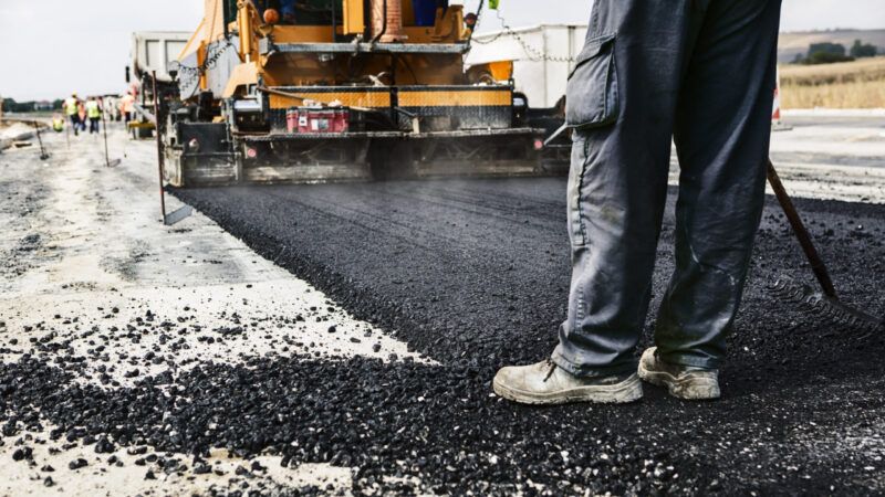 dreamstime_xl_37520865 | Photo <a href="https://www.dreamstime.com/royalty-free-stock-photo-road-construction-worker-operating-asphalt-paver-machine-repairing-works-image37520865">37520865</a> © <a href="https://www.dreamstime.com/wabeno_info" itemprop="author">Wabeno</a> - <a href="https://www.dreamstime.com/photos-images/road-construction.html">Dreamstime.com</a>