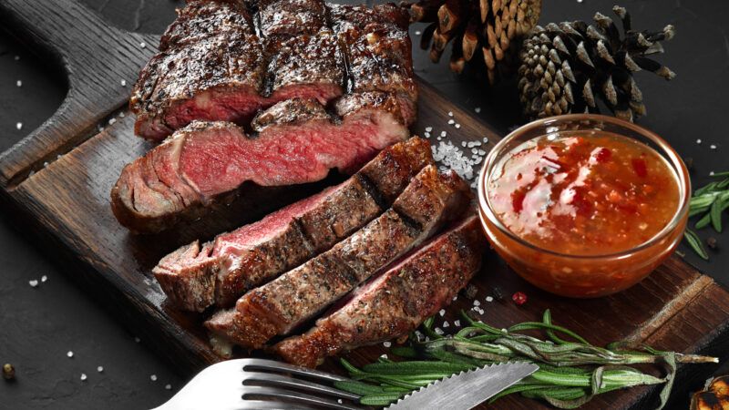 steak | Photo <a href="https://www.dreamstime.com/sliced-grilled-medium-rare-beef-steak-served-wooden-board-barbecue-bbq-meat-tenderloin-top-view-slate-background-image132656159">132656159</a> © <a href="https://www.dreamstime.com/nazarovsergey_info" itemprop="author">Sergey Nazarov</a> - <a href="https://www.dreamstime.com/">Dreamstime.com</a>