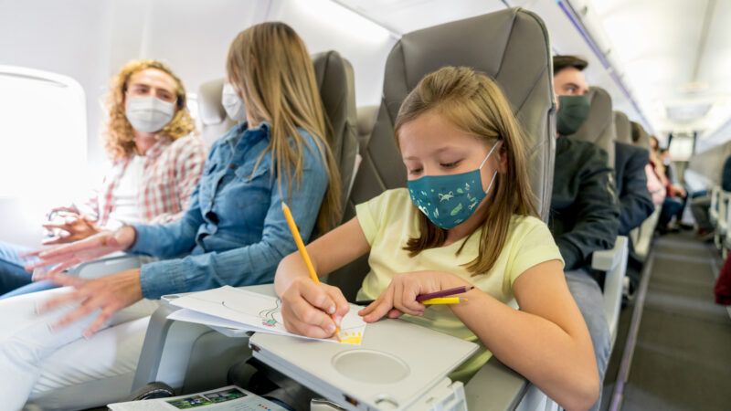 masked-airline-passengers-iStock