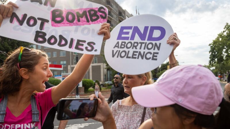 Pro-choice and pro-life demonstrators face off in Washington, D.C., on June 12, 2022.