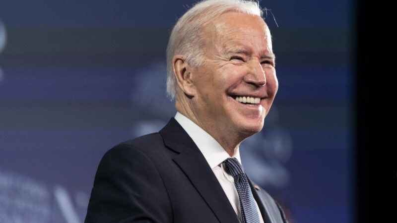 Candid photo of President Joe Biden speaking onstage