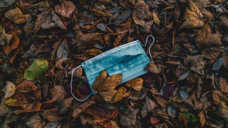 Discarded COVID-19 mask | Photo by <a href="https://unsplash.com/@christianlue?utm_source=unsplash&utm_medium=referral&utm_content=creditCopyText">Christian Lue</a> on <a href="https://unsplash.com/?utm_source=unsplash&utm_medium=referral&utm_content=creditCopyText">Unsplash</a>   