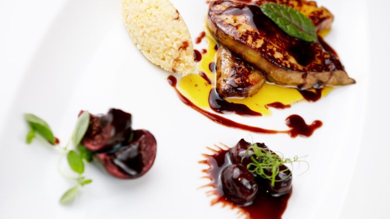 Fried foie gras with cherry sauce and figs