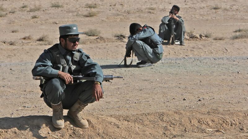 Afghan National Police officers in the desert