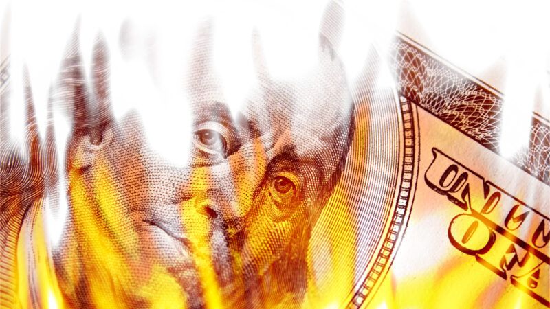 $100 bill on fire | Arenacreative/Dreamstime.com