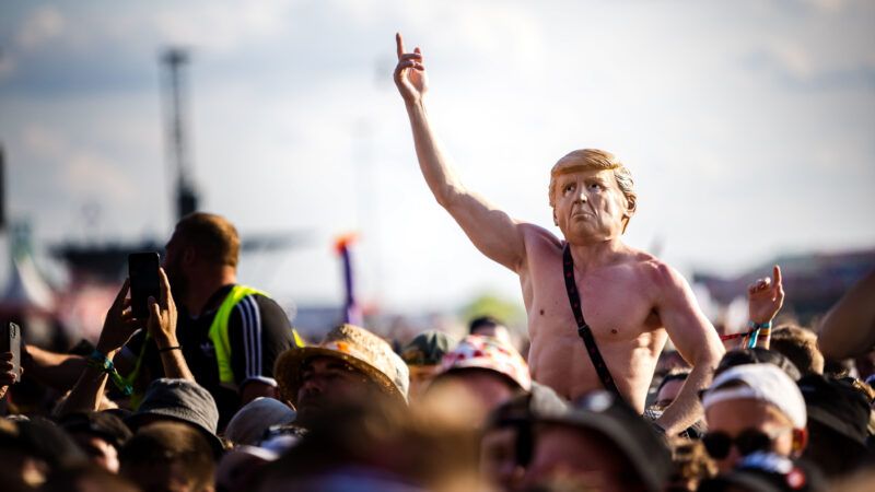 Man in trump mask | Leo Schulz / Alto Press/ZUMAPRESS/Newscom