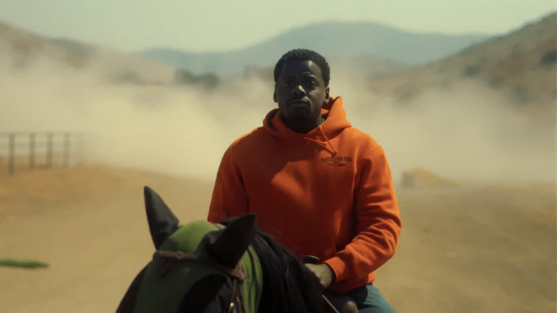 Daniel Kaluuya on a horse in the desert during the movie 'Nope'