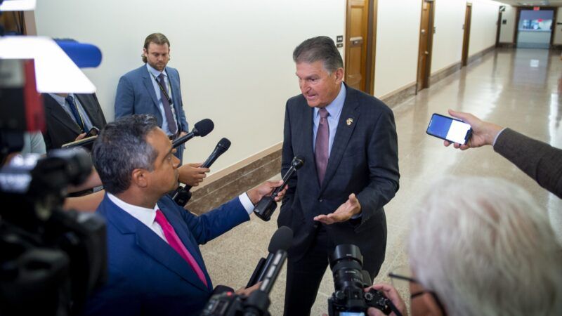 Joe Manchin Chuck Schumer Build Back Better Senate deficit taxes climate change | Rod Lamkey - CNP / MEGA / Newscom/RSSIL/Newscom