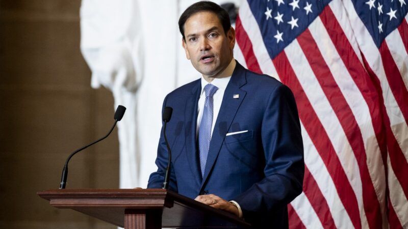 Sen. Marco Rubio speaks at a podium with American flags in background | Michael Brochstein/ZUMAPRESS/Newscom