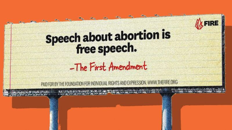 Billboard against an orange background that reads, "Speech about abortion is free speech. -The First Amendment"