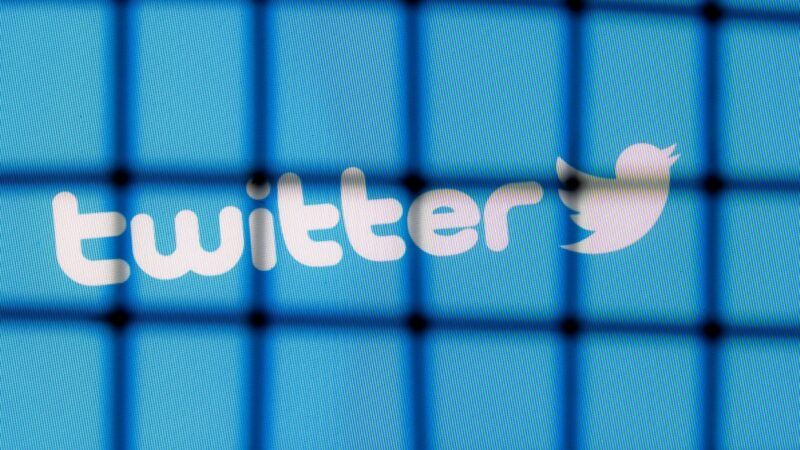 Twitter logo behind bars