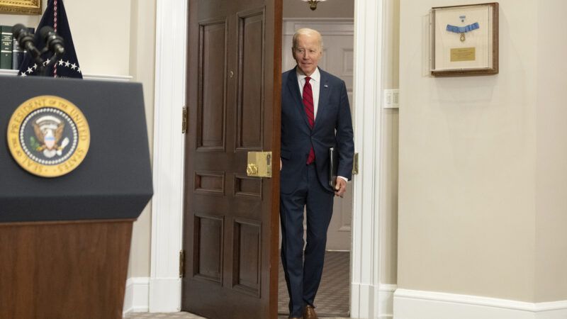 President Biden enters a room
