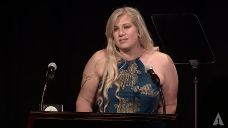 Meg Smaker accepts an award. | Screenshot via YouTube