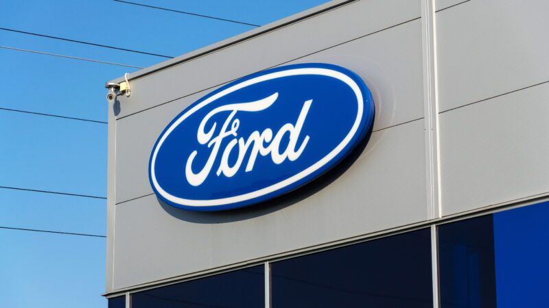 Ford Motor Co. logo on the outside of a franchised dealership.