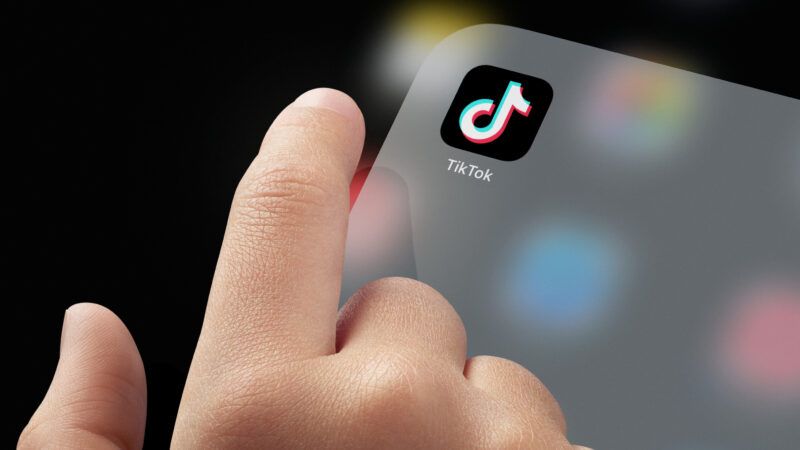 A child presses the button to open TikTok. | Photo 187890355 © Improvisor | Dreamstime.com