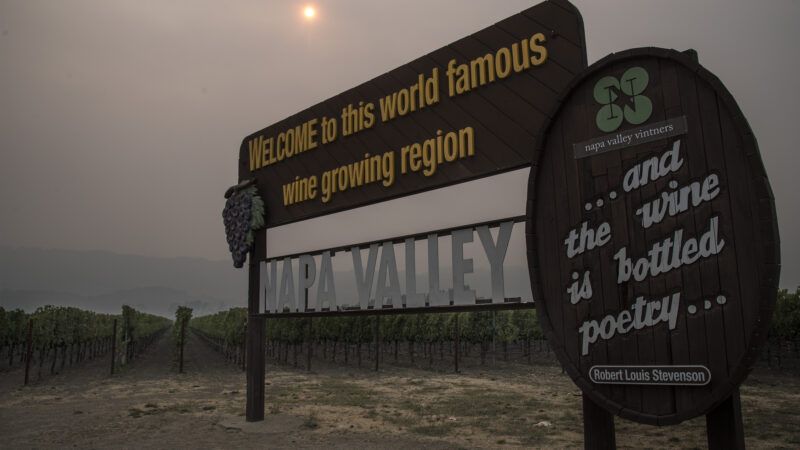 A sign welcoming visitors to Napa Valley stands out amid the smoke following the Glass Fire of 2020
