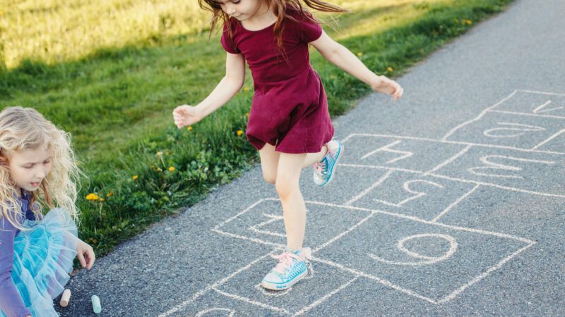 Kids playing outside | Anna Kraynova | Dreamstime.com