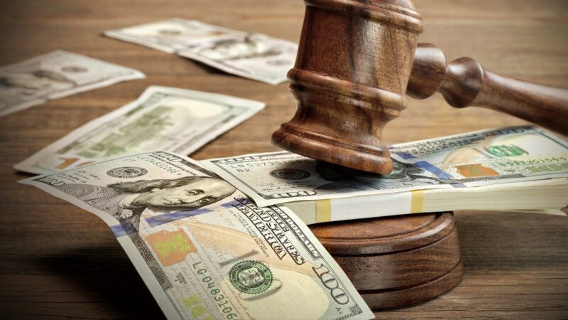 Judges' gavel with cash