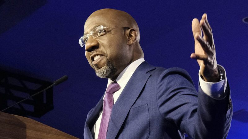 Democratic Sen. Raphael Warnock addresses supporters.