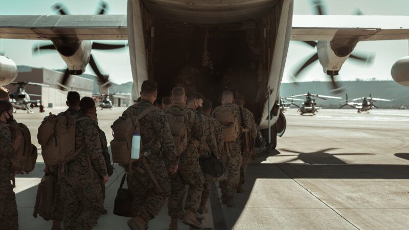 troops boarding plane