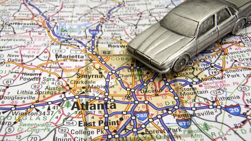 Car driving on a map of Atlanta