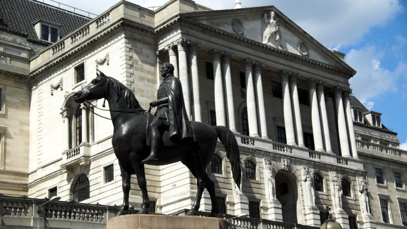 A statue of the Duke of Wellington on his horse, in front of the Bank of England.