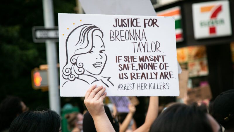 A sign held up at a protest over the killing of Breonna Taylor