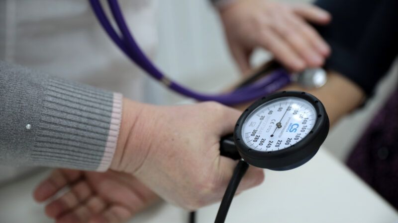 doctor taking blood pressure