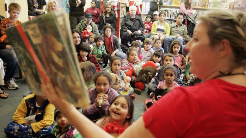 Librarian reading to children