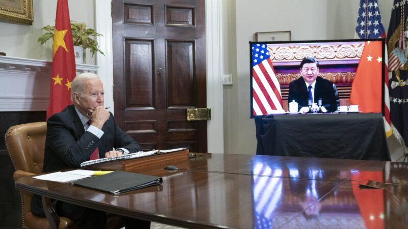 President Joe Biden sits in a room on a teleconference with China | Sarah Silbiger - Pool via CNP / MEGA / Newscom/RSSIL/Newscom