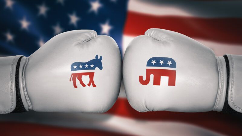 Boxing gloves labeled with the Democratic and Republican party mascots.