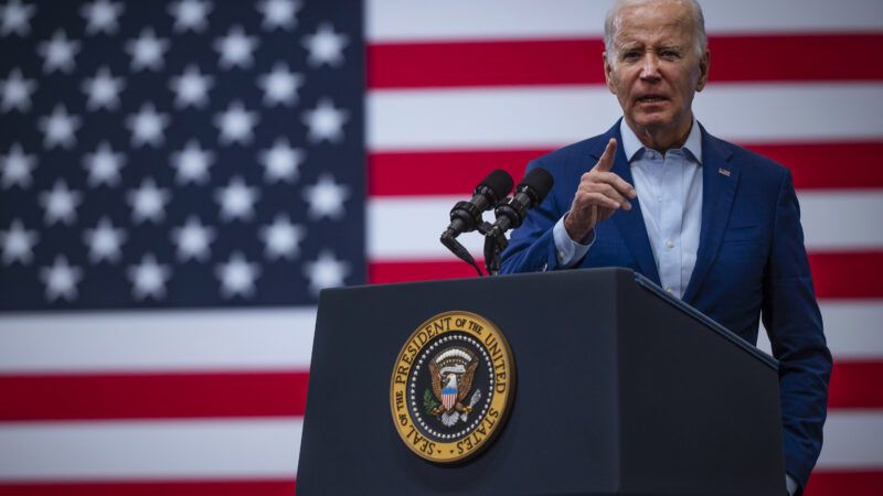President Joe Biden speaks in front of an American flag backdrop | Chancey Bush/ Journal/ZUMAPRESS/Newscom