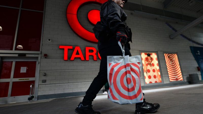 A shopper outside a Target store. | Anthony Behar/Sipa USA/Newscom
