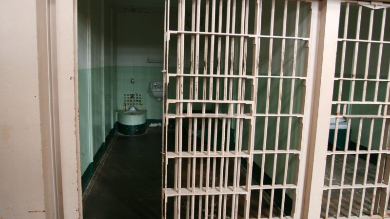 Prison cell with the door open, in Alcatraz. | Chenyun Fan | Dreamstime.com