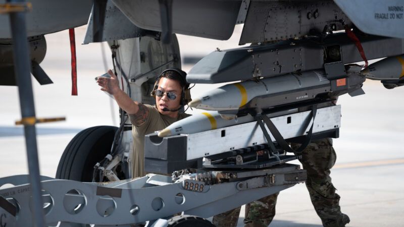U.S. Air Force Staff Sgt. Phan Huy, a weapons team crew chief of the 57th Wing Maintenance Group, loads GBU-39 small diameter bombs onto an A-10C Thunderbolt II, assigned to the 422nd Test and Evaluation Squadron, at Nellis Air Force Base, Nevada, Oct. 24, 2023. This aircraft can hold up to 16 GBU-39 bombs on four designated weapons racks or an assortment of other munitions to broaden mission capabilities. (U.S. Air Force photo by Airman 1st Class Timothy Perish) | U.S. Air Force photo by Airman 1st Class Timothy Perish