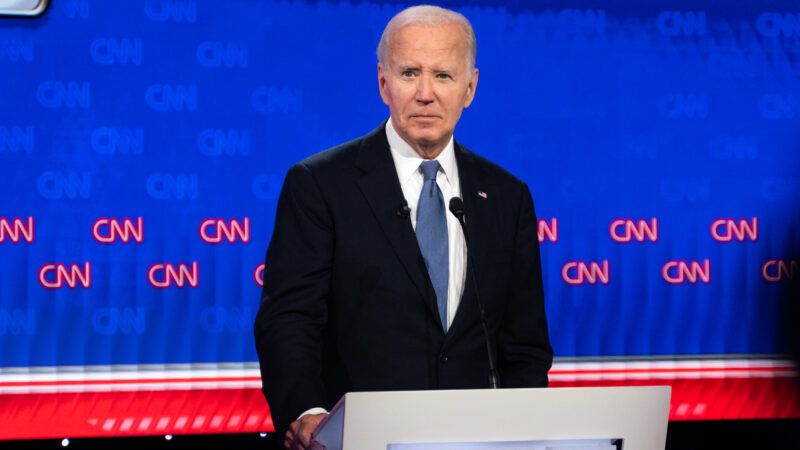 President Joe Biden stands alone on the debate stage behind a lectern. | Ben Hendren/Sipa USA/Newscom