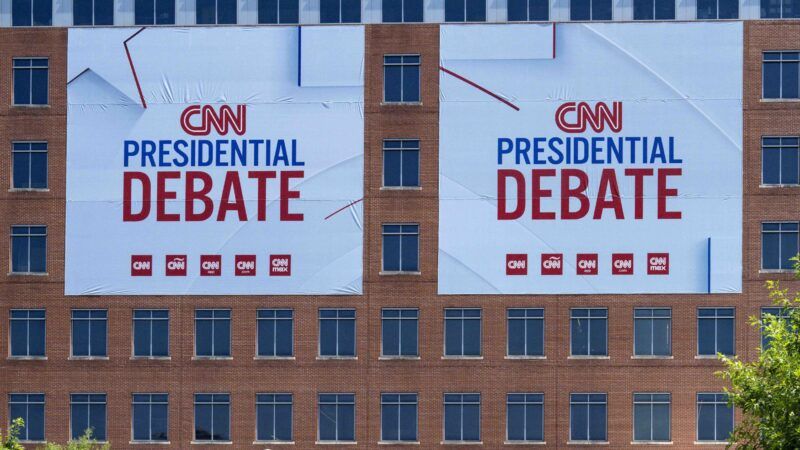 Signs advertising the June presidential debate hosted by CNN | Brian Cahn/ZUMAPRESS/Newscom