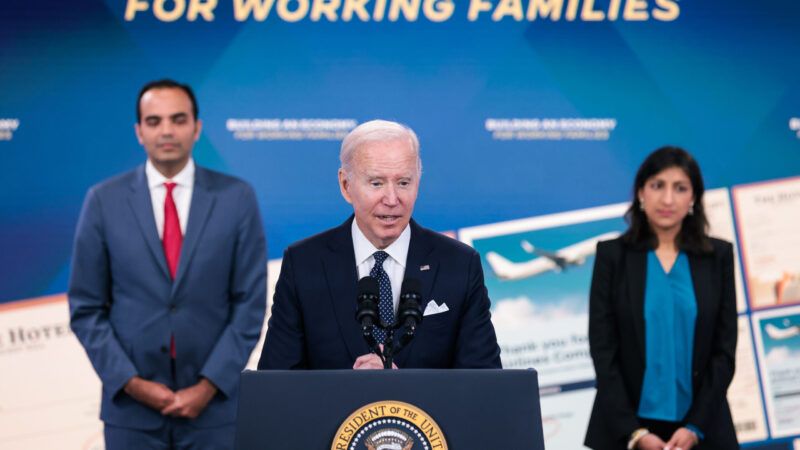 President Joe Biden delivers a speech from a podium, flanked by FTC Chair Lina Khan and CFPB Director Rohit Chopra. | Oliver Contreras/Sipa USA/Newscom