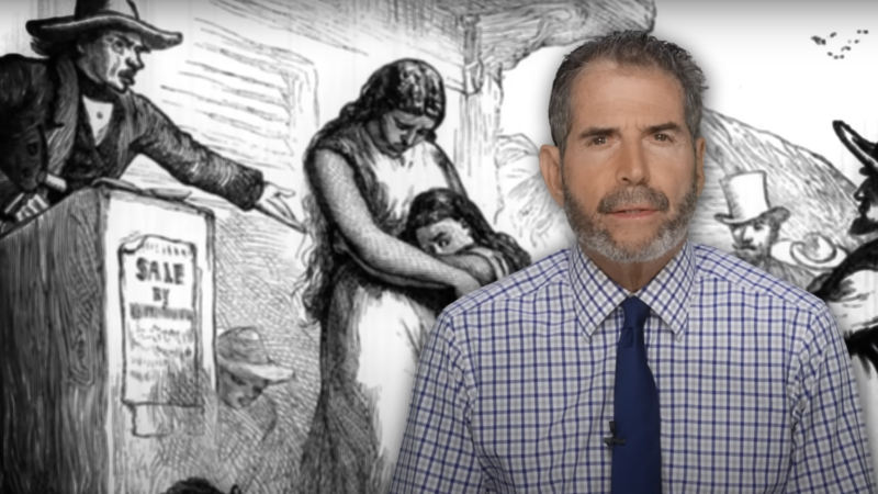 John Stossel is seen in front of a drawing of a slave auction | Stossel TV