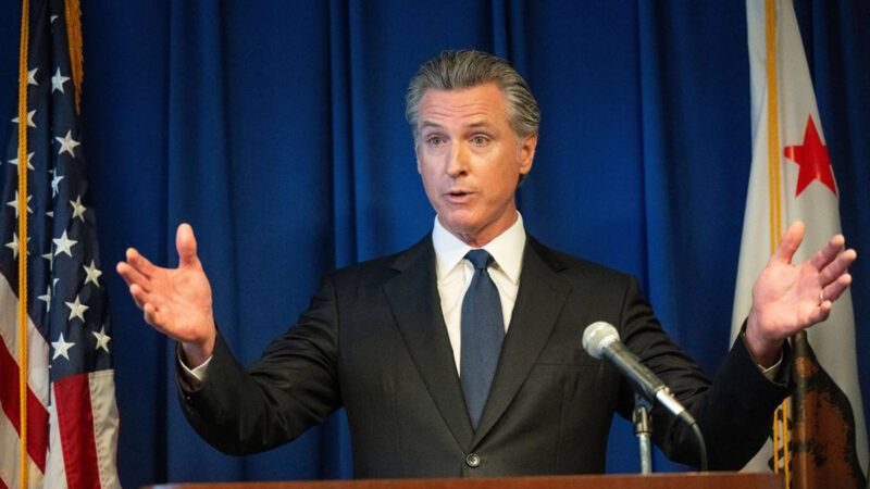 Gov. Gavin Newsom speaking at a podium. | Nathaniel Levine/TNS/Newscom