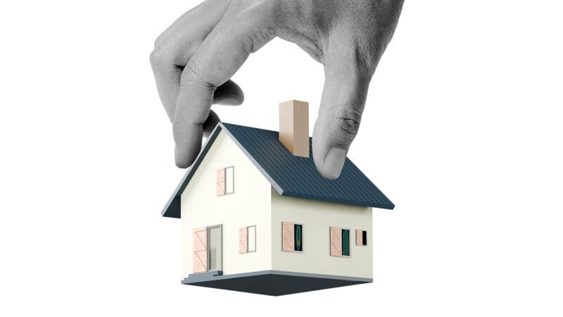 A hand holding a house | Illustration: Ruangrit/iStock