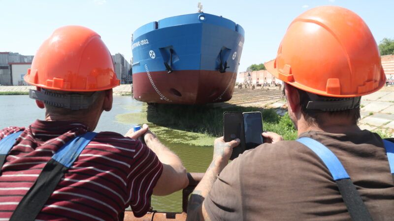 Russian workers attend the launch of an oil tanker in Astrakhan, Russia on August 2, 2024. | Pavel Simakov/ZUMAPRESS/Newscom