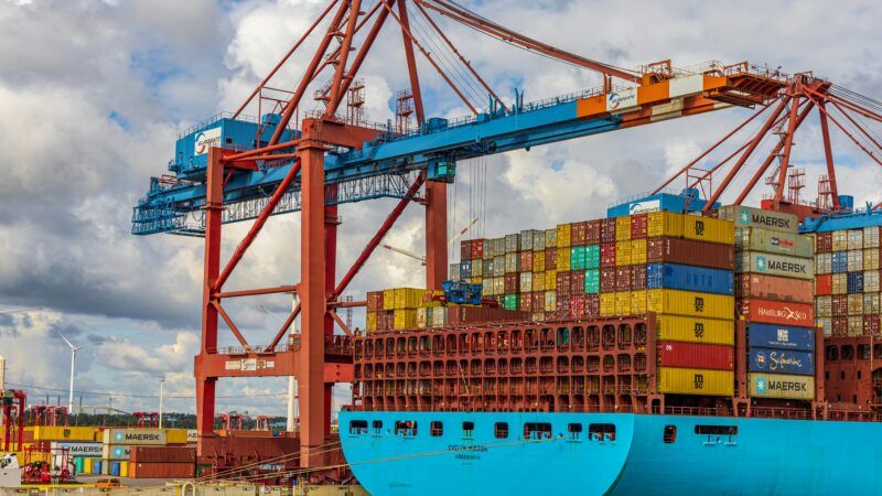 Container ship at port | Photo by Dominik Lückmann on Unsplash