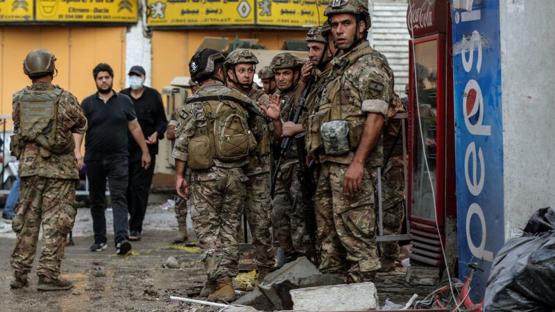 Lebanese army soldiers secure the site where a building was hit by an Israeli airstrike in the southern suburbs of Beirut, Lebanon. 24 September 2024. | Marwan Naamani/dpa/picture-alliance/Newscom