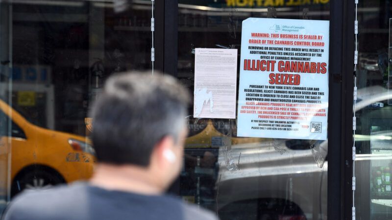 Sign on store window saying marijuana shop was shutdown | Anthony Behar/Sipa USA/Newscom