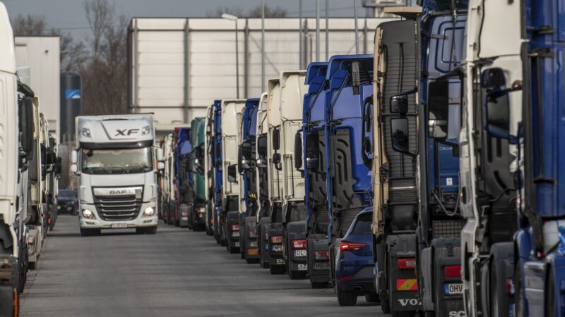 tractor-trailers parked at a logistics center | Image Broker/Jochen Tack/Newscom